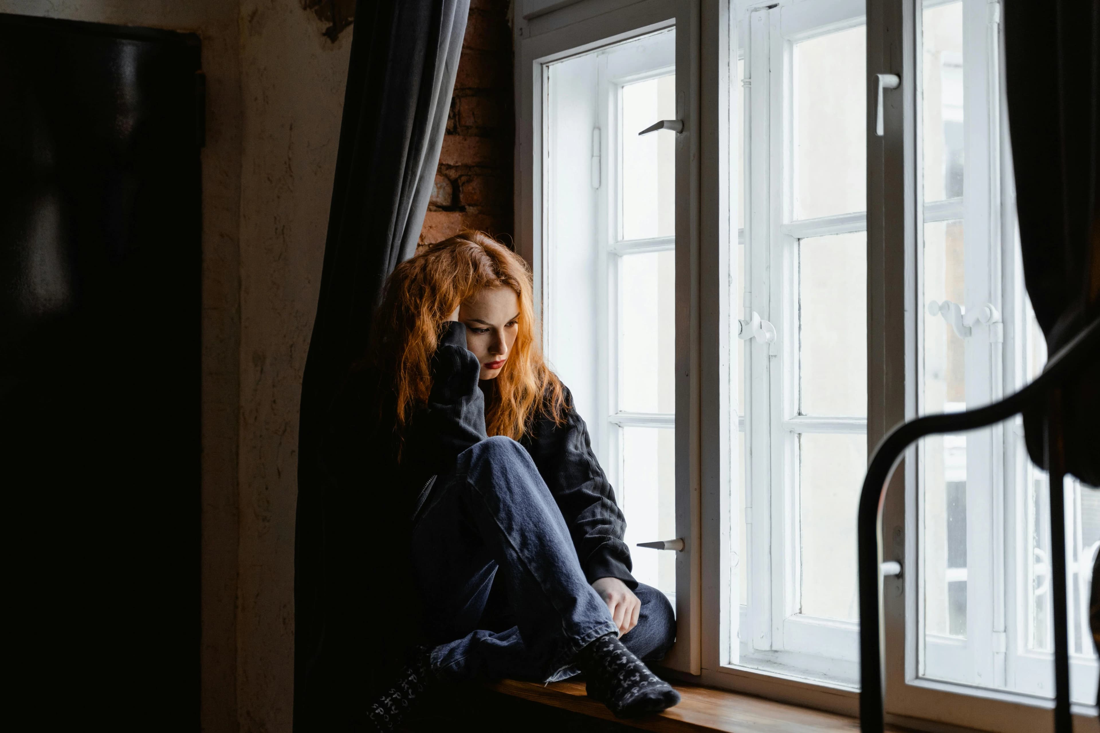 photos of a depressed young woman